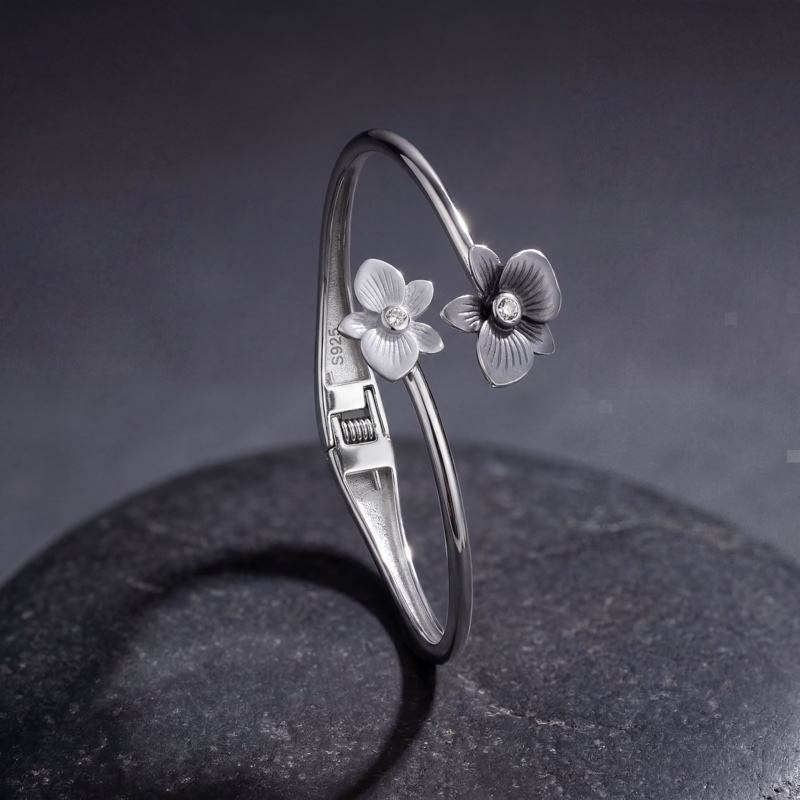 vyanika-silver-dual-flower-bracelet-creative-background